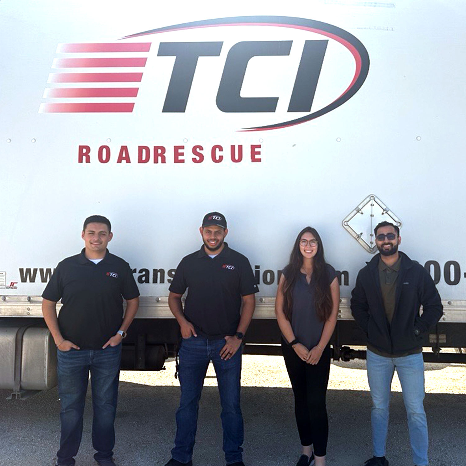 Group of TCI Manager Trainees in front of a TCI truck